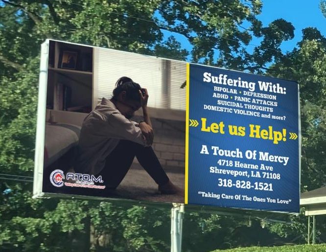 A Touch of Mercy billboard in Shreveport reading: Suffering with bipolar, depression, ADHD, panic attacks? Let us help